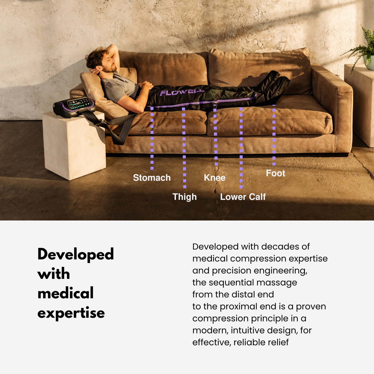 Person using a massage device on a brown couch with labeled massage points.