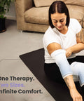 Flowell Prime Luxe Bundle - Woman wearing Flowell thermosleeves on arm and knee. One therapy. Two sizes. Infinite comfort