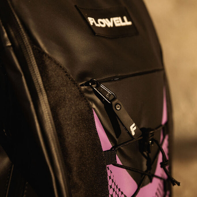 Flowell Pro Gear Backpack - Close up of black and purple Pro Gear Backpack zipper