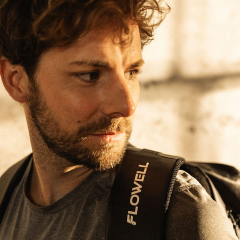 Flowell Pro Gear Backpack - Close up shot of shoulder straps of Pro Gear Backpack in black and purple