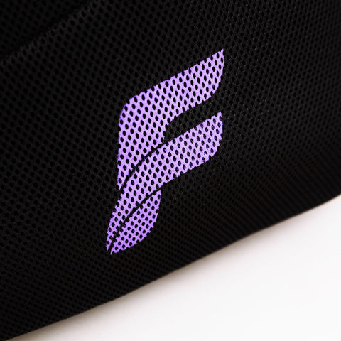 Flowell Pro Gear Backpack - Close up shot of Pro Gear Backpack's purple and black meshing, highlighting the Flowell logo