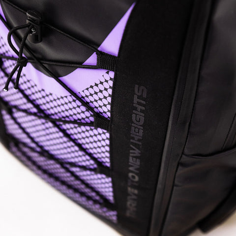 Flowell Pro Gear Backpack - Close up shot of Pro Gear Backpack's purple and black design and straps