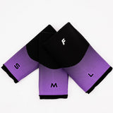 Flowell Thermosleeve - PBlack and purple thermosleeves in Small, Medium and Large arranged on a white background